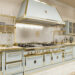 THE KITCHEN GETS DRESSED UP IN 24-CARAT GOLD:Officine Gullo presents the most luxurious of finishes